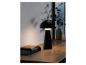 Une lampe de table noire avec un abat-jour en forme de champignon sur une table en bois.
