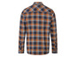 Une chemise à carreaux bleu marine et orange à manches longues.