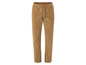 Pantalon en velours côtelé marron avec cordon de serrage et fermetures éclair en bas.