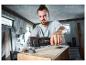 Outil multifonction sans fil 12 V PARKSIDE PERFORMANCE ponçant une surface en bois