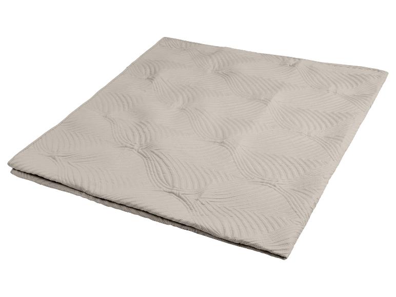 Housse de matelas matelassée beige avec un motif de feuilles