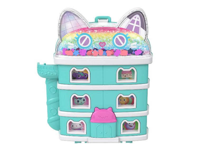 Un jouet Gabby's Dollhouse en forme de tête de chat avec plusieurs étages et de petites figurines.