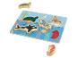Puzzle en bois avec des animaux marins, dont un dauphin, un morse et une orque.