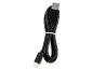 Câble noir USB-A vers USB-C, enroulé et sécurisé par un lien blanc.