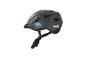 Un casque de vélo noir avec un motif géométrique