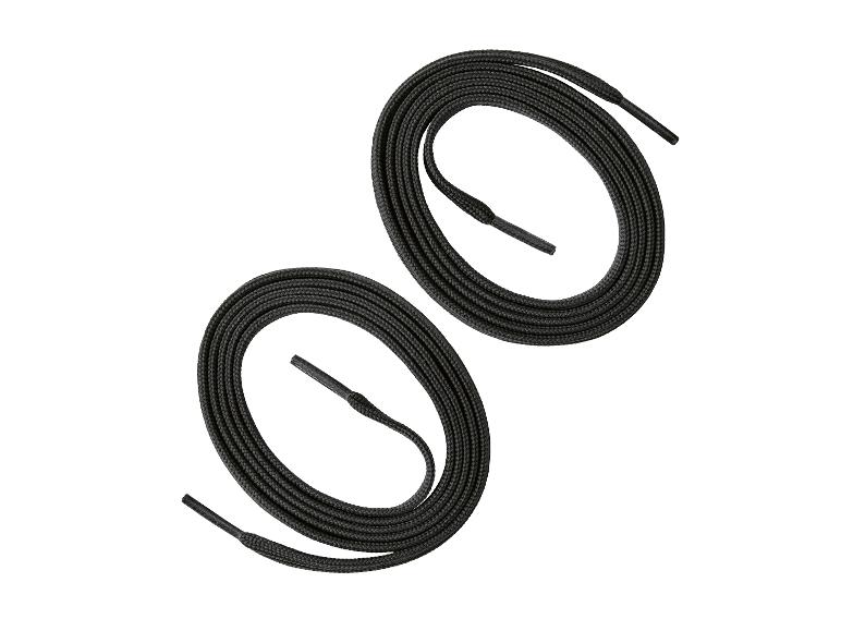 Deux paires de lacets noirs sur fond blanc