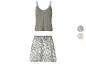 Ensemble de pyjama femme avec débardeur vert à fines bretelles et short à motifs.