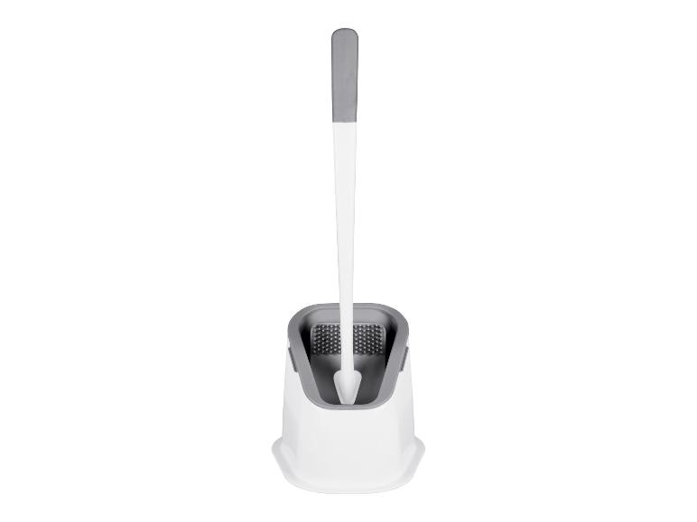 Brosse de toilette avec support, design moderne et élégant.