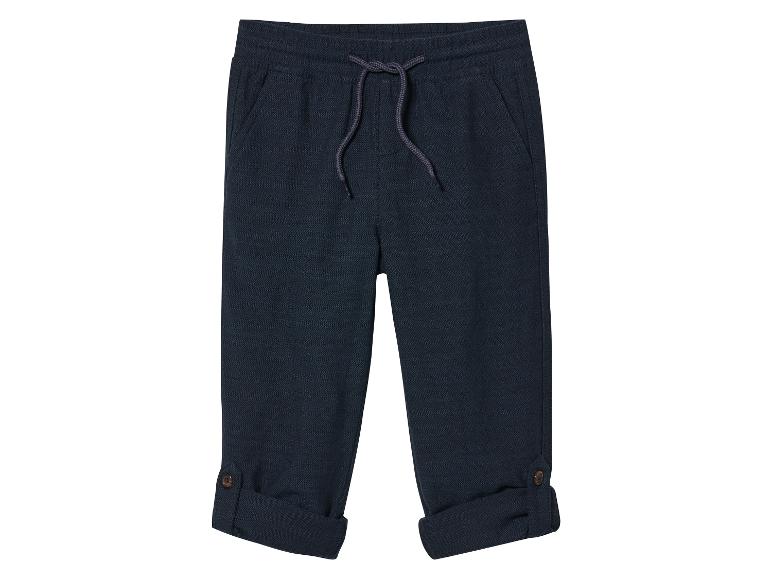 Pantalon bleu foncé à cordon pour garçon.