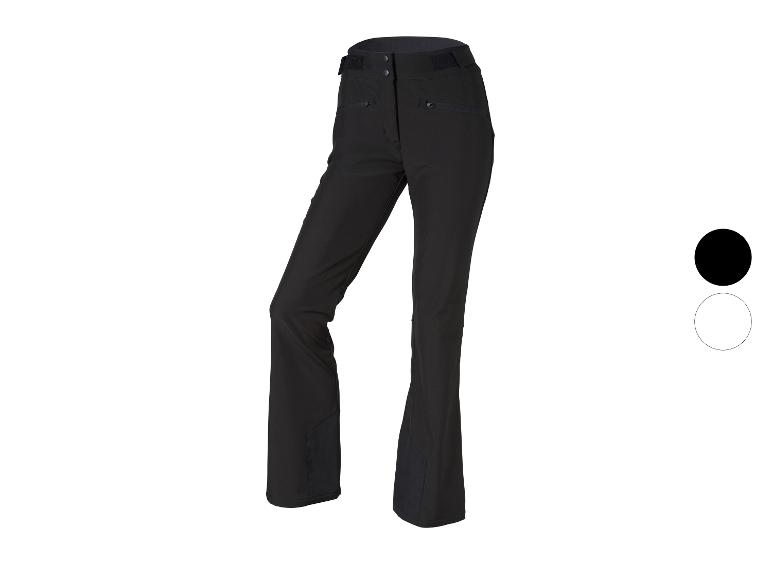 Pantalon de ski noir avec poches zippées et taille ajustable.