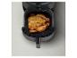 Poulet rôti dans une friteuse Philips Rapid Air.