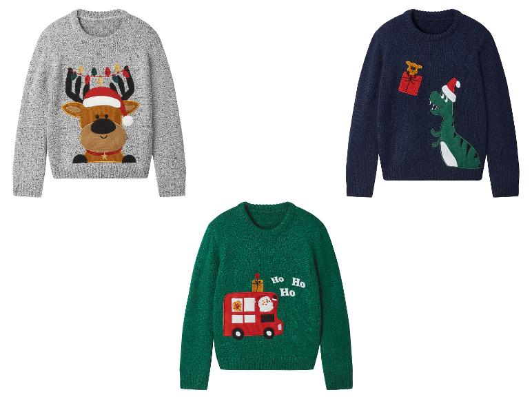 Trois pulls de Noël pour enfants : un renne, un dinosaure et un bus avec le Père Noël.