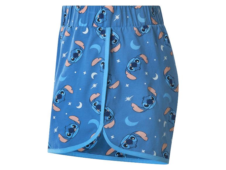 Short de pyjama bleu avec motif de personnage de dessin animé, lune et étoiles.