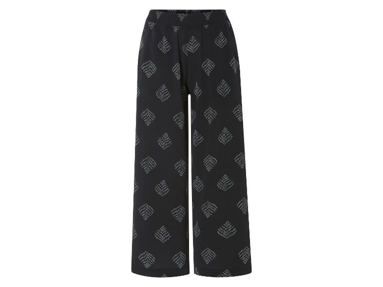 Pantalon large noir à motif feuilles.