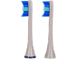 Deux têtes de brosse à dents, l'une avec des poils bleus et turquoises, l'autre avec des poils bleus et turquoises.