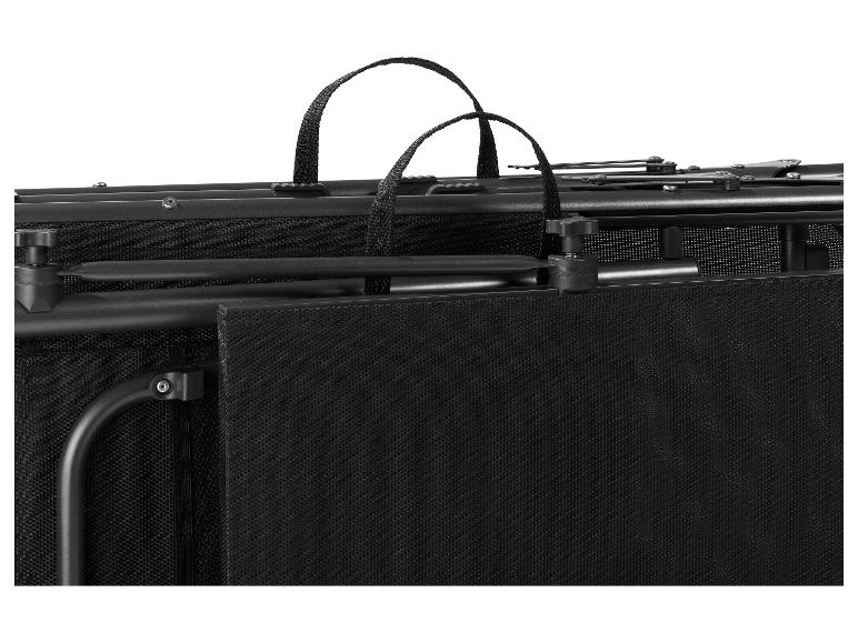 Deux sacs de rangement noirs pliés avec poignées et détails métalliques