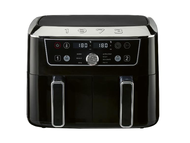 Friteuse à air double noire avec écran numérique et programmes de cuisson.