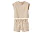 Ensemble enfant beige avec t-shirt à manches courtes motif soleil et short.