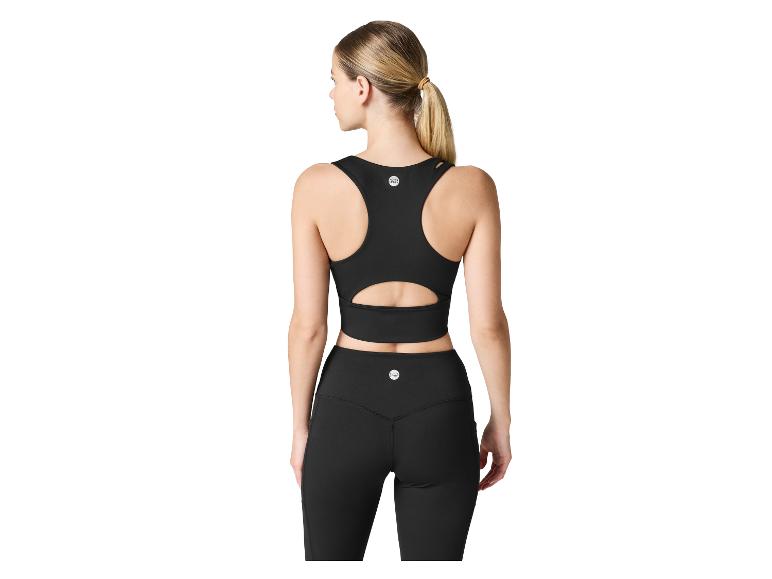 Femme en haut de sport noir et leggings Jette Sport, vue de dos