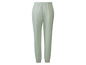 Pantalon de survêtement vert pour femme.