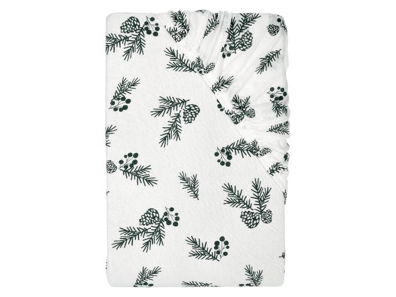 Drap-housse blanc avec imprimé de pommes de pin et de branches vertes