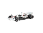 Voiture de course miniature blanche et noire avec des détails rouges