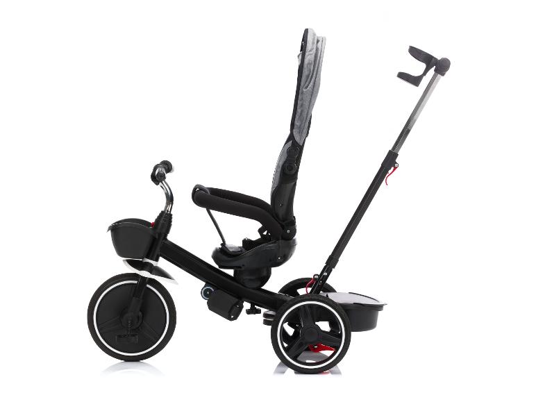 Tricycle noir pour enfant avec siège gris et poignée, vu de côté.
