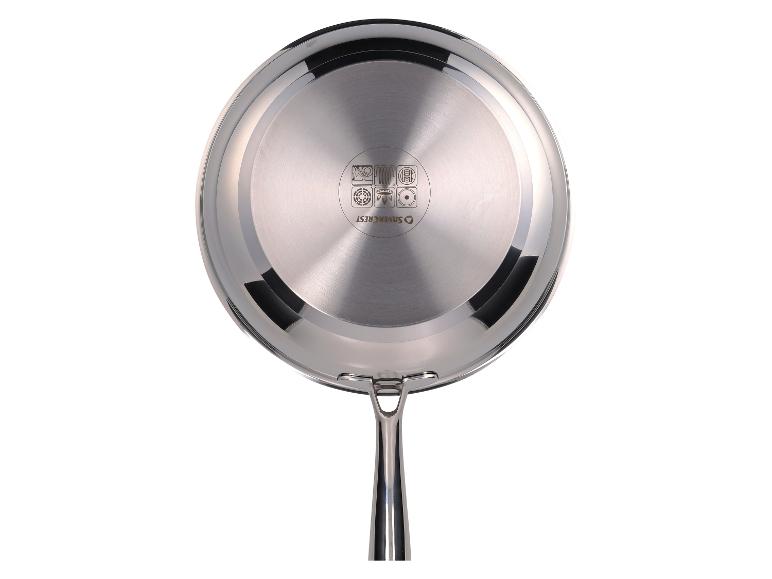 Fond d'une poêle à frire Silvercrest en acier inoxydable avec symboles de compatibilité table de cuisson.