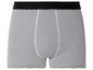 Boxers blancs à rayures grises.