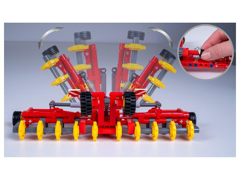 Modèle de tracteur Lego Technic avec pièces mobiles.