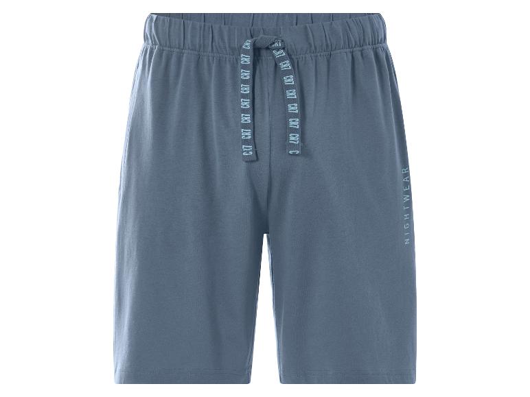 Short de pyjama bleu avec cordon de serrage, texte « CR7 » et « NIGHTWEAR » sur la jambe.
