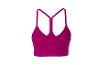 Soutien-gorge de sport violet pour femme avec bretelles en Y sur fond blanc.