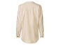 Une chemise en coton crème à manches longues.