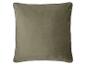 Coussin en velours vert avec passepoil