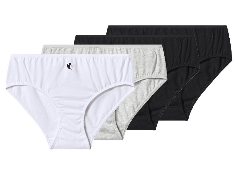 Lot de quatre culottes pour femmes en blanc, gris et noir.