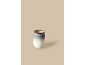 Tasse en céramique avec effet ombré dans des tons beige, marron et blanc.