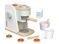 Une machine à café en bois jouet avec deux tasses, un carton de lait et des grains de café.