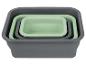 Ensemble de bacs pliables gris et vert pâle : idéal pour le rangement ou la cuisine.