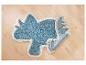 Un tapis bleu en forme de dinosaure