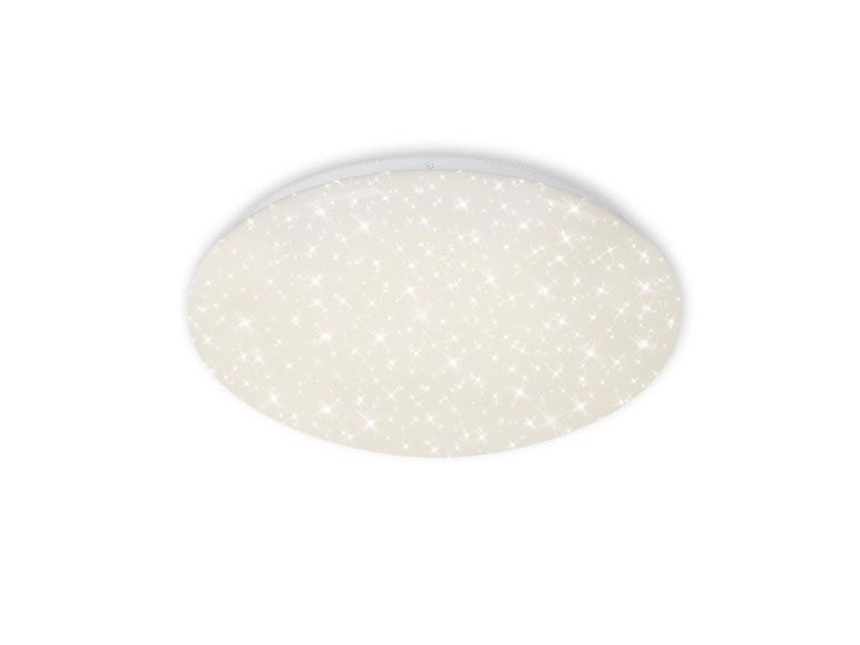 Plafonnier rond avec un motif d'étoiles scintillantes sur un fond clair.
