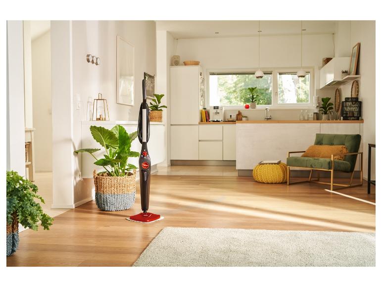 Nettoyeur vapeur Karcher sur un sol en bois dans une maison moderne.