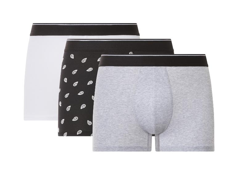 Lot de trois boxers pour hommes: blancs, noirs à motifs et gris