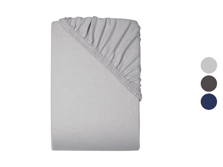 Drap-housse gris clair, présenté verticalement, avec des échantillons de couleur à droite.