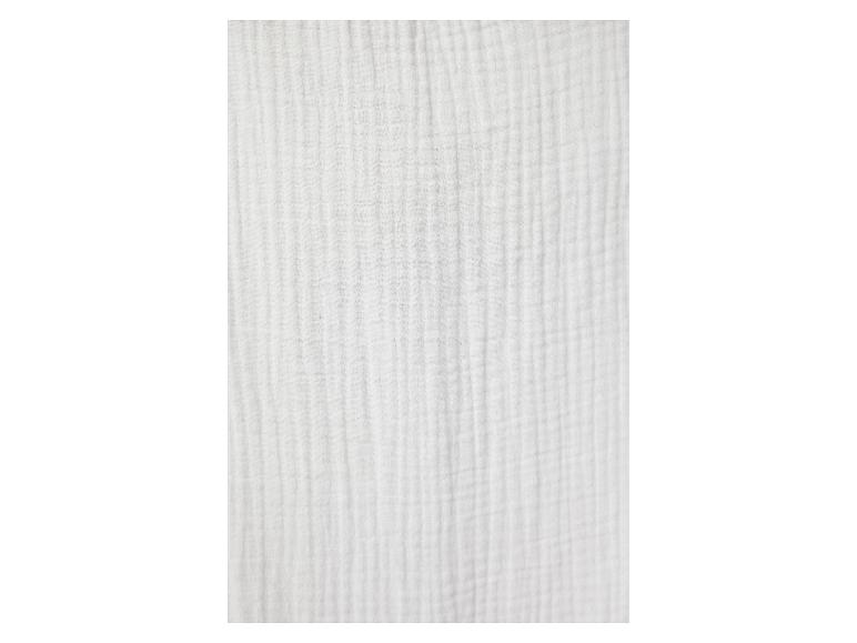 Tissu blanc en mousseline de coton.