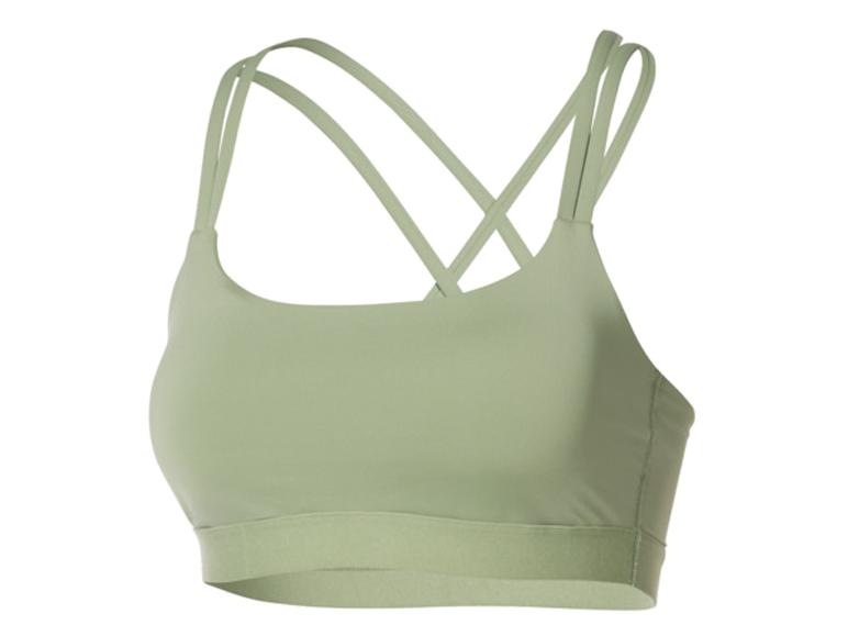 Soutien-gorge de sport vert clair avec bretelles croisées dans le dos.