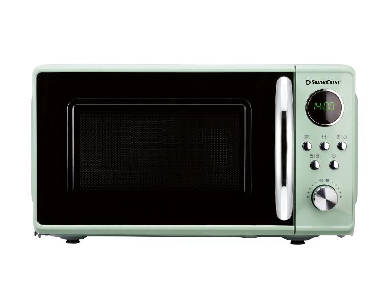 Micro-ondes SilverCrest rétro couleur menthe.