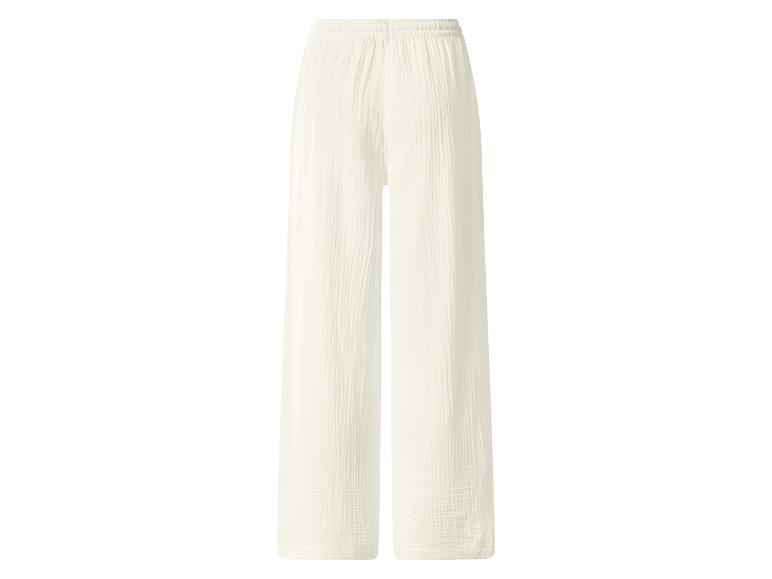 Pantalon large blanc en mousseline avec taille élastique.