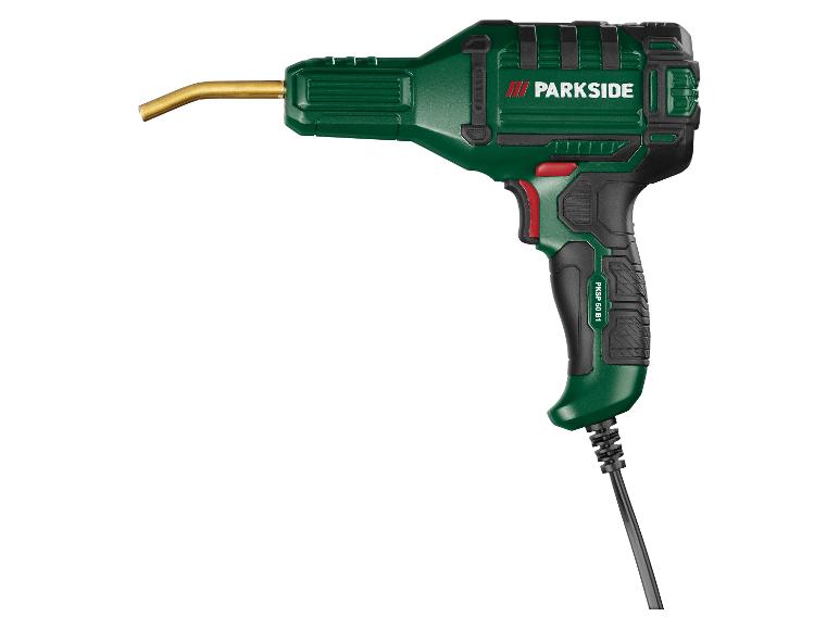 Fer à souder pistolet vert avec poignée noire et pointe en laiton.