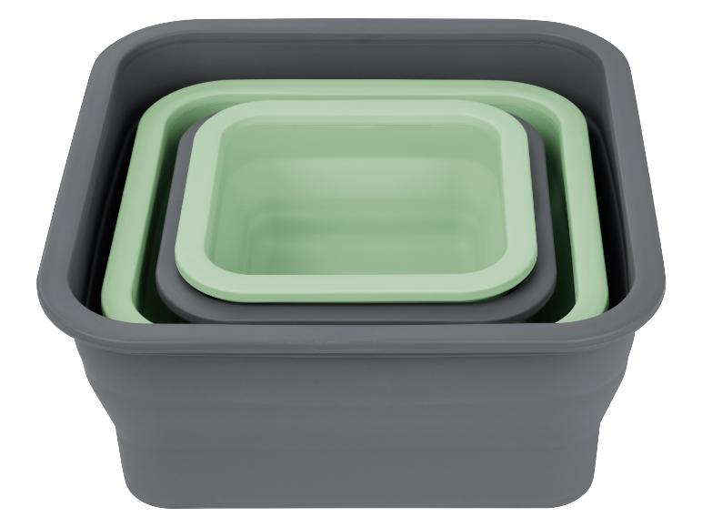 Ensemble de trois bacs empilables, gris et vert pâle.
