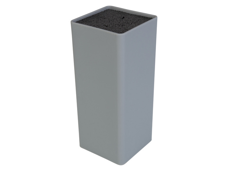 Un bloc à couteaux gris avec un rembourrage en mousse noire.